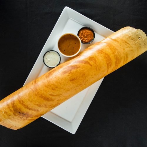 Dosa - Traditional Indian savory crepe served at our Australia South Indian food restaurant.